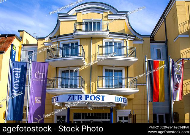 22 March 2021, Mecklenburg-Western Pomerania, Ahlbeck: The entrance area of the hotel ""Zur Post"" on the Baltic Sea island Usedom