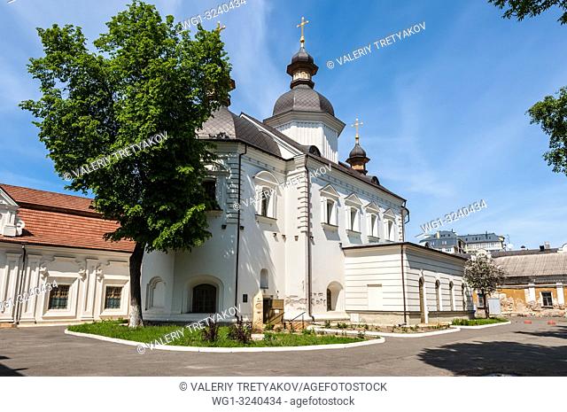 Kyiv, Ukraine - May 10, 2015: Refectory with the church of the Holy Spirit (1631) in the Kiev-Mohyla Academy at historic district called Podil (Podol)