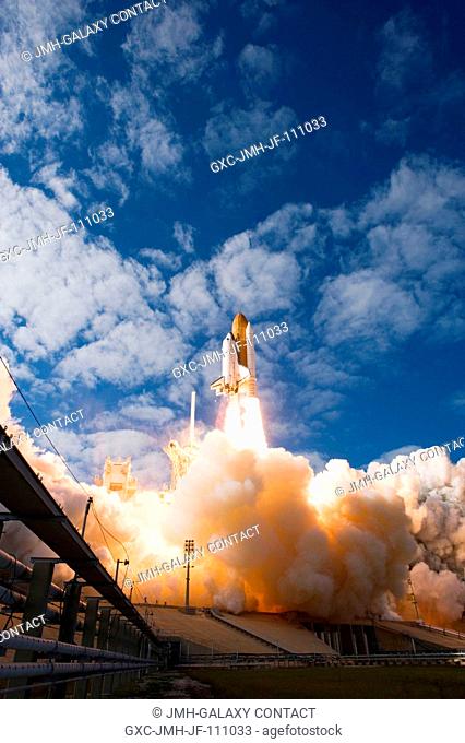 Space Shuttle Atlantis and its six-member STS-129 crew head toward Earth orbit and rendezvous with the International Space Station