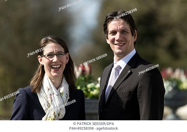 Bjoern, Count of Bernadotte and Bettina Countess of Bernadotte pose in front of flowers on the island Mainau, Germany, 23 March 2017