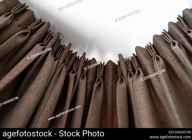 Brown curtains on a rail with a white ceiling. Curtain interior decoration in living or sleeping room. Comfortable live in your own home