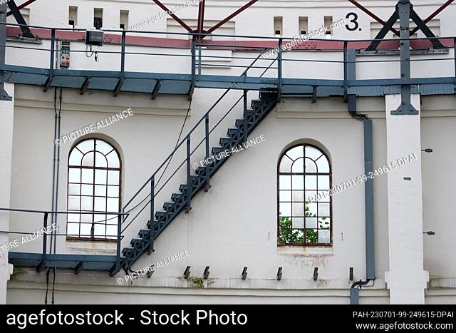 30 June 2023, Saxony, Leipzig: Stairs and walkways of an old gasometer in the south of the city. The 14-meter-high and nearly 45-meter-wide building from around...