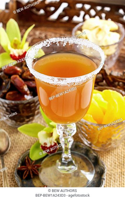 Sweet drink made of tropical fruits. Party dessert