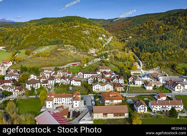 Aerial view of a village and hills. Ezcaroz village in Pyrenees. Navarre, Spain, Europe