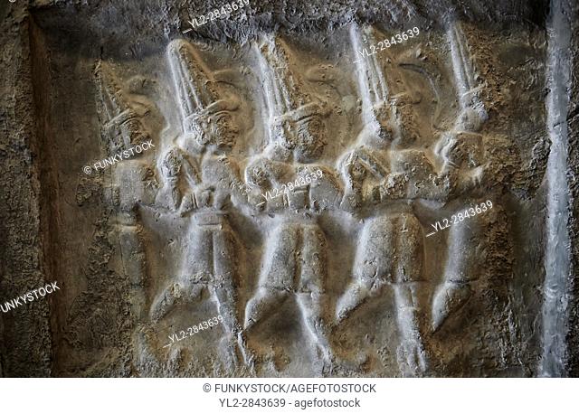 Hittite relief sculptures of Gods at the Yazilikaya Sancutary [ i. e written riock ], Hattusa, Turkey. The largest known Hittite sanctuary