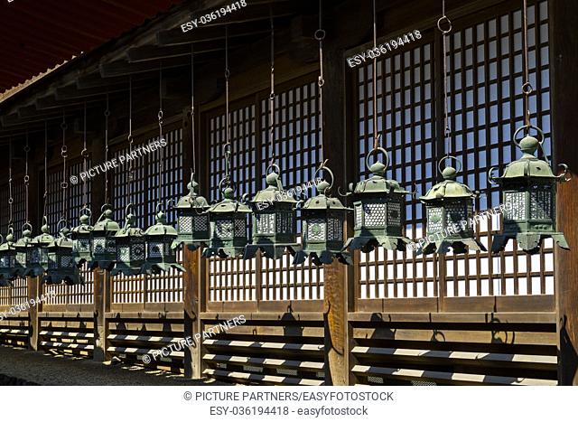 Nara - Japan, Row of bronze lanterns at the Kasuga Taisha shrine