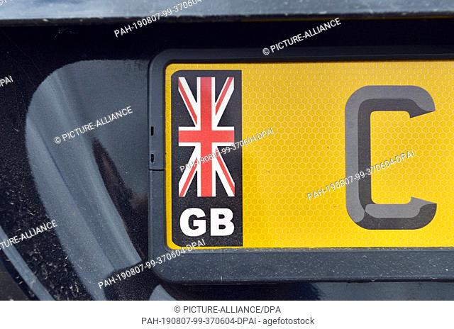 12 July 2019, Great Britain, St Ives: The country code GB for Great Britain, Great Britain on a car registration plate. Photo: Hendrik...