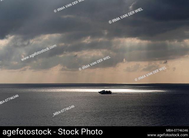 Ferry of Milazzo after Lipari, shortly after sunrise in front of the coast Liparis