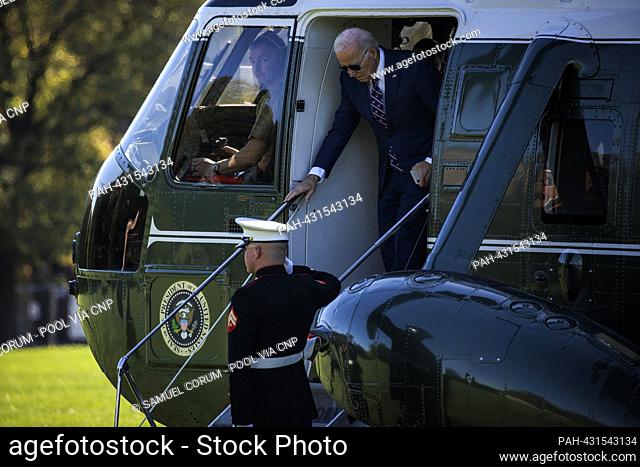 United States President Joe Biden steps off Marine One at Fort Leslie McNair on October 23, 2023 in Washington, D.C. The President and First Lady spent the...