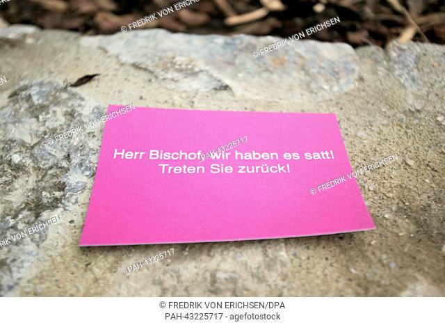Unknown have placed a card reading 'Bishop, we have had enough! Resign!' on a wall at the chapel of the bishop's house opposite to the Limburg Cathedral in...
