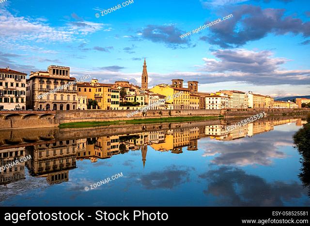 FLORENCE, TUSCANY/ITALY - OCTOBER 18 : View of buildings along and across the River Arno in Florence on October 18, 2019. Unidentified people