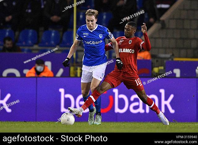 Genk's Kristian Thorstvedt and Antwerp's Michel Ange Balikwisha fight for the ball during a soccer match between KRC Genk and Royal Antwerp FC RAFC