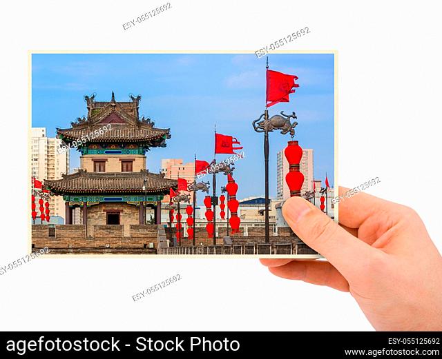 Hand and North wall of old town - Xian China (my photo) isolated on white background