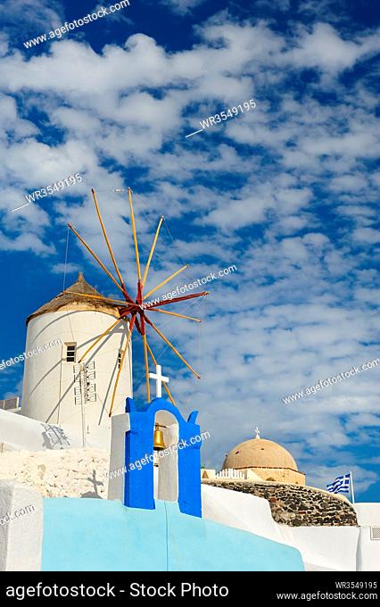 View of Oia windmill at the Island Santorini, Greece. Lot of copyspace