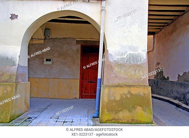 sidewalk with arcade and street, Linyola, Lleida, Catalonia, Spain