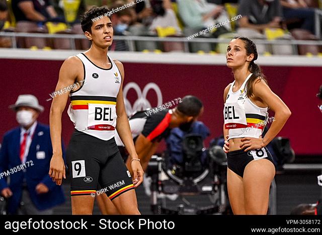 Belgian Jonathan Sacoor and Belgian Camille Laus react after the final of the 4x400m men relay race on day 17 of the 'Tokyo 2020 Olympic Games' in Tokyo