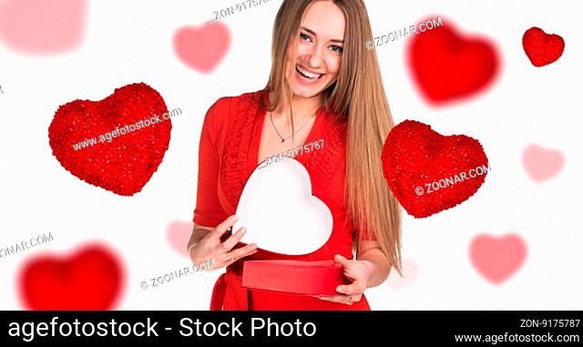 Young woman with red heart box in hand and falling hearts on white background