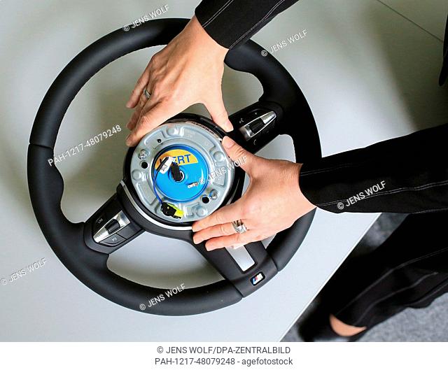An airbag igniter is built into a steering wheel for a car at the Takata Ignition Systems Gmbh factory in Schoenebeck, Germany, 17 April 2014
