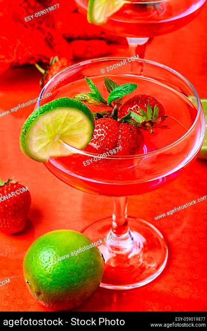 Martini glass with strawberries and red lace