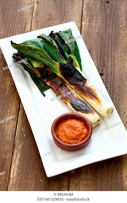 roasted calcots with romesco sauce for dipping, catalan cuisine