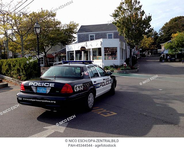 A patrol car of the police in Edgartown stops at a road crossing on the island Martha's Vineyard, Massachusetts, USA, 09 October 2013