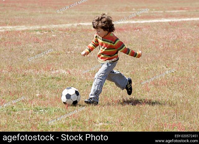 Child playing football