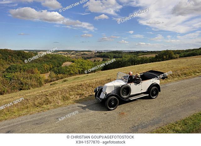 drive with an open touring vintage car Renault 1925 around Auch Gers department, Midi-Pyrenees, southwest of France, Europe
