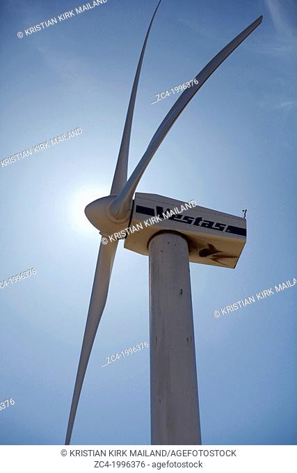 Vestas wind turbine, close against blue sky