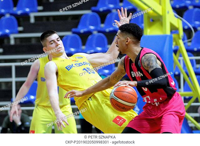 L-R VACLAV BUJNOCH (Opava) and OLIVIER HANLAN (Bonn) in action during the 14th round of group B, basketball Champions League, BK Opava and Telekom Baskets Bonn