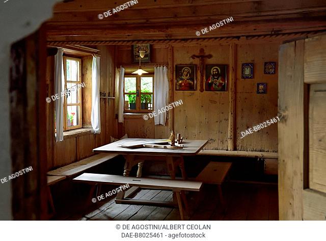 The dining room of Rohrerhof, maso (local rural building) displaying old rooms and items of the rural tradition, Sarntal, Trentino-Alto Adige, Italy
