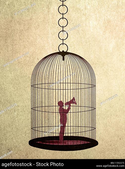 Man trapped inside birdcage shouting through megaphone