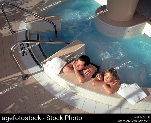 Couple Relaxes in a Whirlpool
