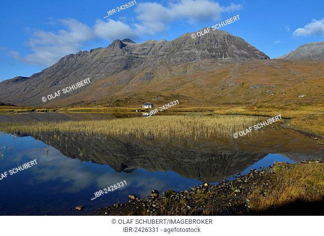 Mountains reflected in a lake in the Highlands in front of Liathach hill, Glen Torridon, Beinn Eighe National Nature Reserve, SNH, Kinlochewe, Wester Ross