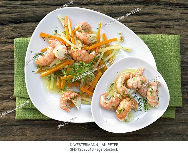 Crab cakes with carrots, celery and mustard seeds