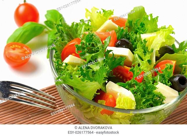 bowl of fresh vegetable salad with feta cheese