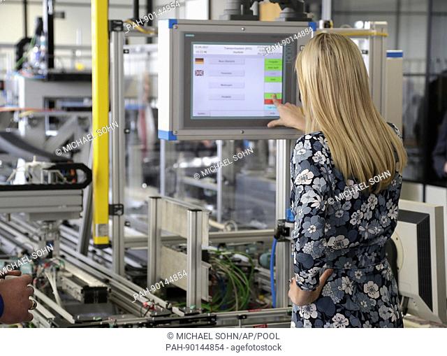 Ivanka Trump, First Daughter and Advisor to the US President touching a screen during her visit to the Siemens Technik Akademie (TA) academy in Berlin, Germany
