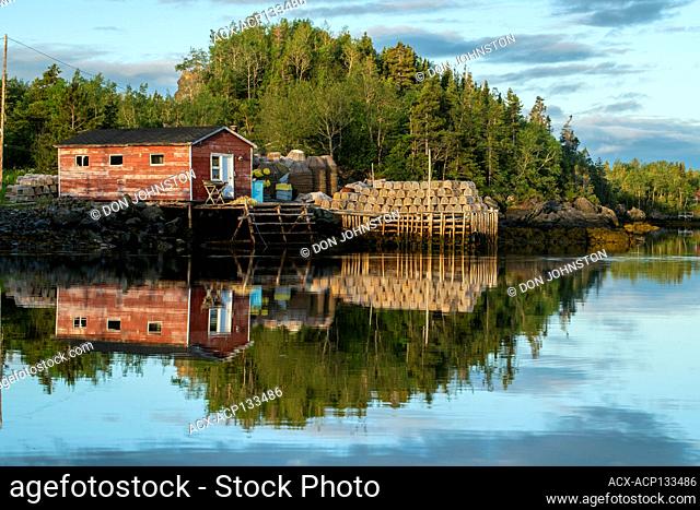 Fish stage and lobster traps on wharf, Pilley's Island causeway, Newfoundland and Labrador NL, Canada