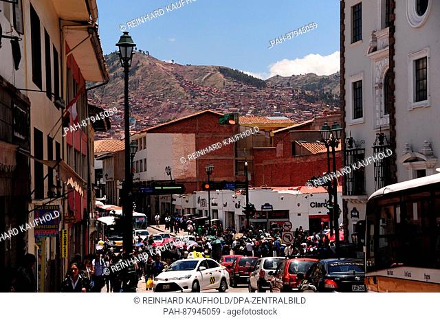 Out and about in the old capital of the powerful Inca empire and the later colonial town of Cuzco. View of a busy street in the Old Town. Taken 25.10