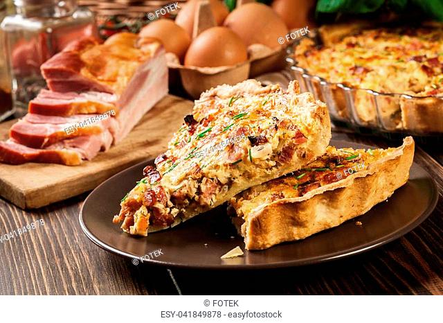 Pieces of quiche lorraine with bacon and cheese. French cuisine