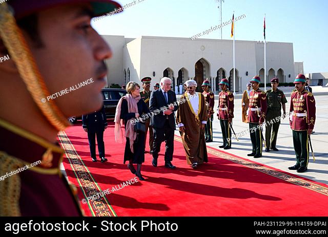29 November 2023, Oman, Maskat: Federal President Frank-Walter Steinmeier (M) and his wife Elke Büdenbender are seen off by Sayyid Badr bin Hamad bin Hamoud...