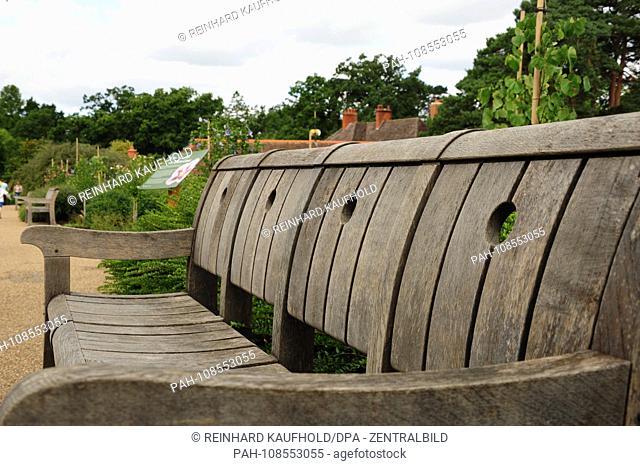 Horticulture is presented in the 100 ha garden of the Royal Horticultural Society in Wisley in the south of England - wooden garden bench