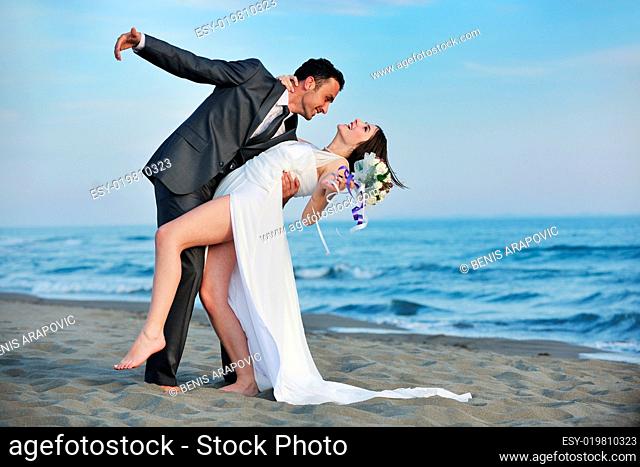 romantic beach wedding at sunset