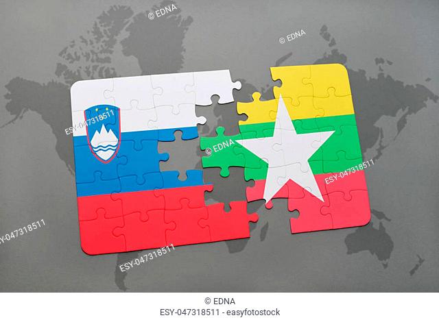 puzzle with the national flag of slovenia and myanmar on a world map background. 3D illustration