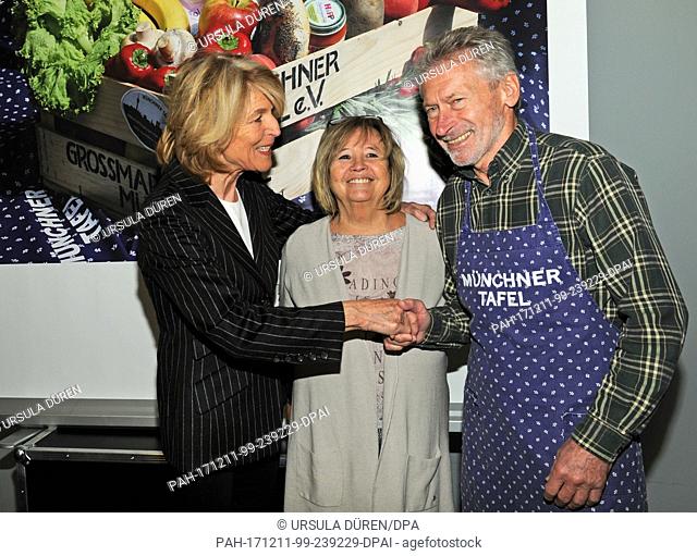 Hannelore Kiethe, president and founder of Munchner Tafel e.V. ('Munich Food Bank') (L), greeting former national soccer player Paul Breitner and his wife...
