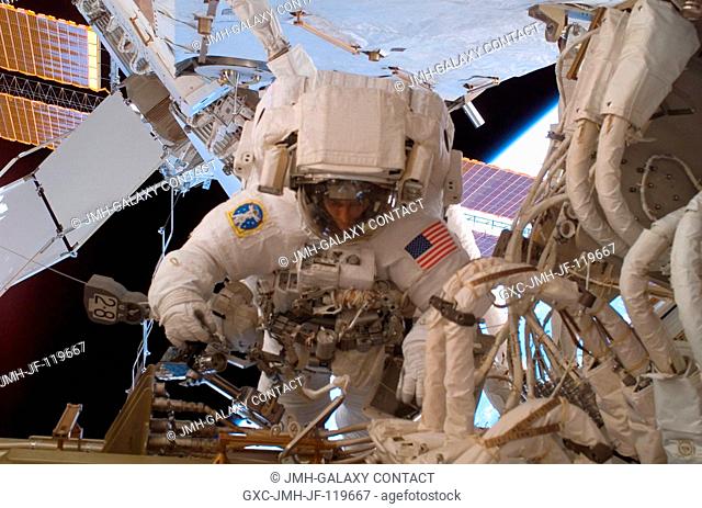 Astronaut Sunita L. Williams, Expedition 14 flight engineer, participates in the first of three sessions of extravehicular activity (EVA) in nine days