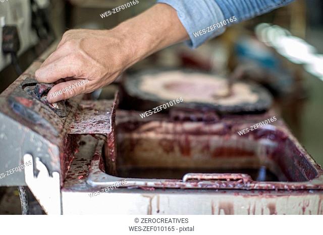 Artist mixing sculpting mould wax
