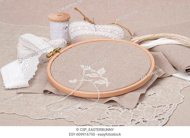 Sewing And Embroidery Craft Kit. Natural Linen Background