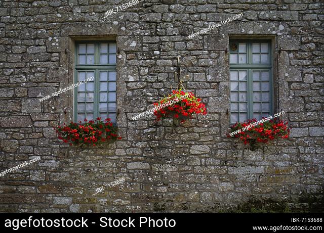 Window with floral decorations, Locronan (Lokorn), Finistère, Brittany, France, Europe