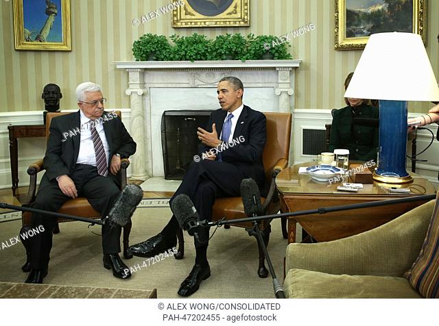 United States President Barack Obama (R) meets with Palestinian President Mahmoud Abbas (L) in the Oval Office of the White House in Washington, DC