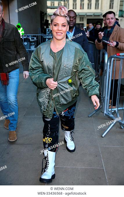 Singer Pink visiting BBC Radio studios to promote her album 'Beautiful Trauma'. Pink saw a fan who had a massive portrait tattoo of her face and stopped by to...